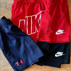 4 Pairs of Boys Size 4 Nike / Under Armour Shorts